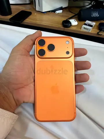 Apple iPhone 17 pro max  sim version with orange case - Good condition