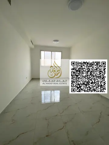 One bedroom and living room for rent in Al Jurf 3, Ajman, with two bathrooms, a balcony, an open view, and excellent finishing. Payment in 4 or 6 inst