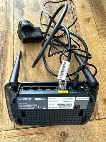 Linksys Wireless Router with Power Adapter and Ethernet Cable - Working Condition