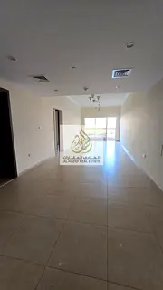 For annual rent in Al Bustan, Ajman, a spacious 1-bedroom apartment with a living room, featuring a