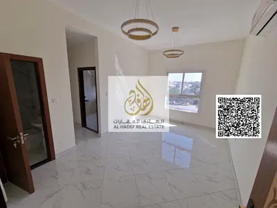 For rent in Ajman, first occupancy, two bedrooms, a living room with 2 bathrooms and a balcony in Al Nuaimiya on Al Ittihad Street next to D2D and Gif