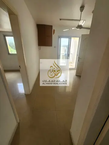 Two bedroom apartment for rent in Sharjah Al Maysaloon near Kuwait Roundabout with balcony garden access and family friendly location
