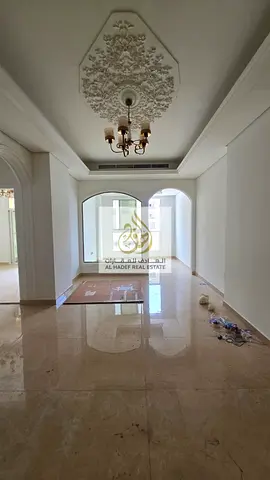 For rent in Al Muwaihat 3, a one-bedroom apartment with a living room (second tenant) in a prime location behind Saudi German Hospital and close to th