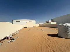 Two walled plots of land for rent in Al Sajaa on Kar Street, without electricity.,,,,,,,,,,,