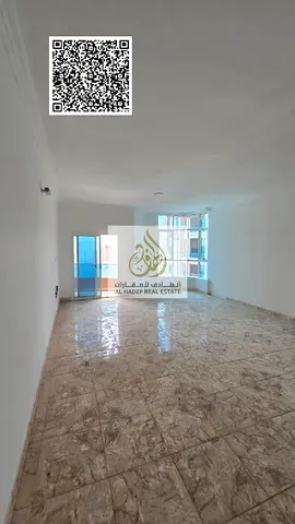 Three-bedroom apartment with a living room and a maid's room in Al Nuaimiya Towers