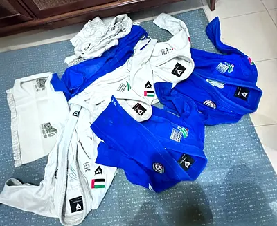 Used Brazilian Jiu-Jitsu Gis (Blue  White) - Multiple Gi Jackets Caracal size C3