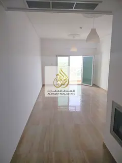 Annual rent in Ajman, Al Nuaimiya 3 area, near Dubai Islamic Bank. Two-bedroom apartment with a livi