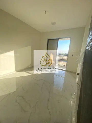 One bedroom and living room with bathroom, first occupancy, open view and separate balcony, excellent modern finishes, and at the lowest price in Ajma
