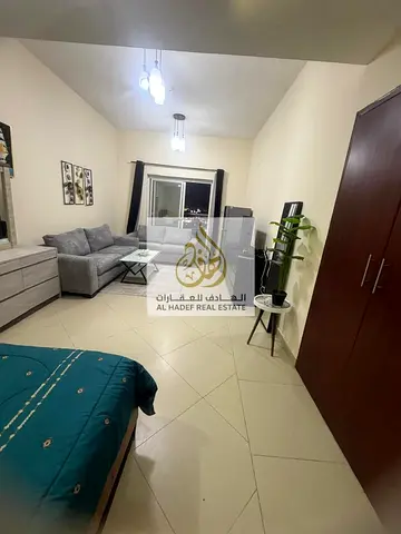 Monthly rent in Ajman, Al Nuaimiya 1, Al Shurooq Towers, near Al Hikma School, Stilo Cafe, furnished studio with new furniture, separate kitchen, balc