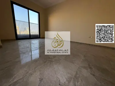 Two bedrooms, a living room, a bathroom, a balcony, a separate lounge with a hallway, first occupancy, a separate lounge in Al Jurf 3, close to the Ch