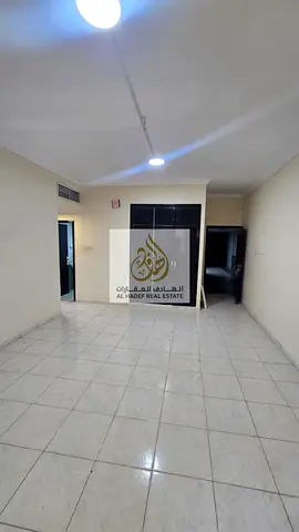 A very spacious one-bedroom apartment available for annual rent in Al Rashidiya 3, on Traffic Street, in a prime location close to Ajman One Towers, w