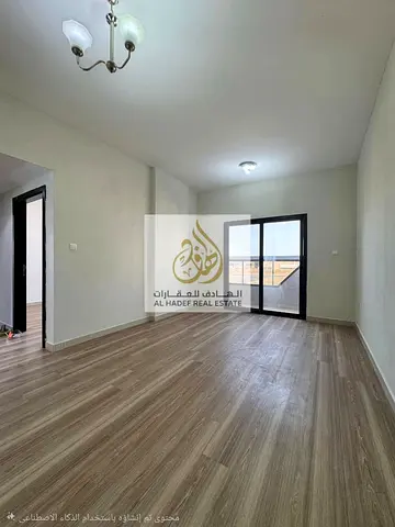 Al Jurf 3, on Mohammed Bin Zayed Road, prime location close to services and the mosque - 2 bedrooms, living room, 2 bathrooms with balcony - spacious,