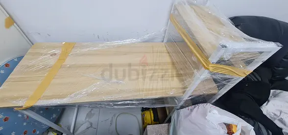 Light wood study/computer desk in good condition, wrapped for transport
