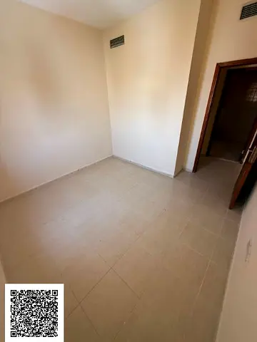 One-bedroom apartment with a living room in Ajman