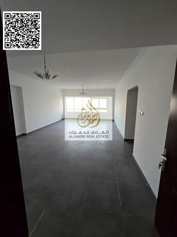 Two-bedroom apartment with a living room and two bathrooms, one month free, and free parking. One of the largest apartments in Ajman at the lowest pri