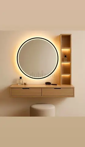 Wall-mounted floating vanity with round LED mirror and shelving