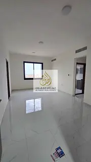 Al-Aliya area, on the main road, very close to Sheikh Mohammed Bin Zayed Road - First occupancy - On