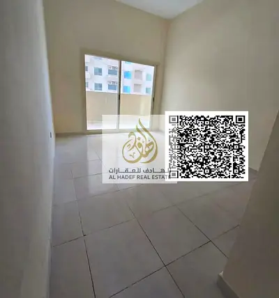 For annual rent in Al-Amirah, Ajman: a one-bedroom apartment with a living room, bathroom, and balcony. Very spacious, prime location directly on Shei
