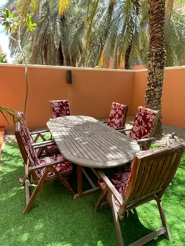 Wooden Outdoor Dining Set with Cushioned Chairs
