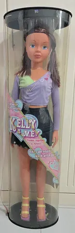 Genuine Kelly  Me walking doll in original cylinder packaging - like new