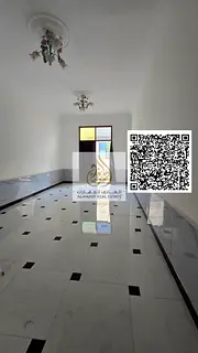For annual rent in Rawda 3: a spacious studio apartment with a separate kitchen and large balcony, f