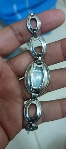 Mango womens bracelet watch - silver-tone link design, working needs battery