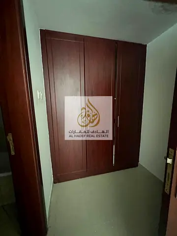 2BHK in Al Taawun, 2 bedrooms, 3 bathrooms, maid's room, balcony, wardrobe, gym and swimming pool, on the Dubai exit, security deposit.