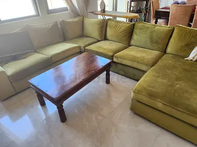 Large Olive Green L-shaped Sectional Sofa with Wooden Coffee Table