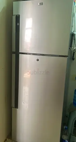 Compact Silver Refrigerator - Good Condition, 650 AED, Available 13 June