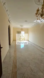 One-bedroom apartment with a living room and two bathrooms available. Features include built-in ward