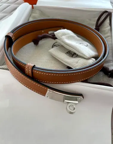Genuine tan leather belt with silver buckle - unused condition