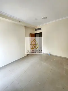 Two bedroom apartment for rent in Sharjah Al Khan with balcony storage room and free parking in a pr