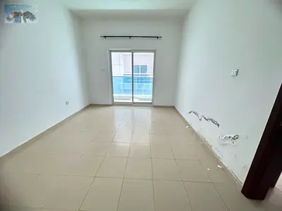 Two-bedroom apartment with living room for annual rent in City Tower, directly on Khalifa Street. F