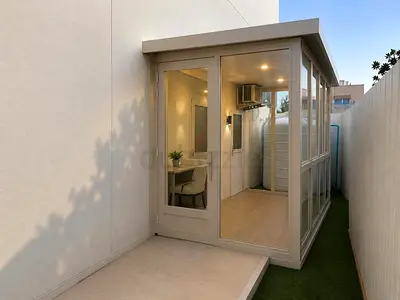 Outside Mad room,Guard Room with simple door and transom window