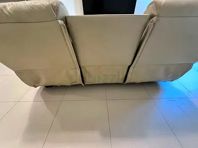Cream leather 3-seater reclining sofa