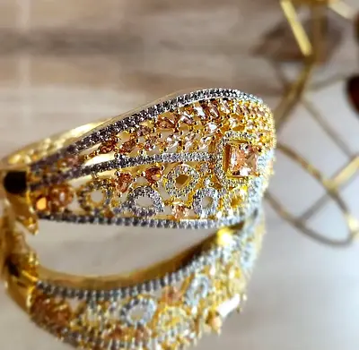 Pair of Gold-tone Ornate Ladies Bracelets with Stones