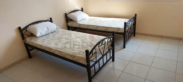Pair of Black Metal Single Beds with Mattresses - heavy deuty