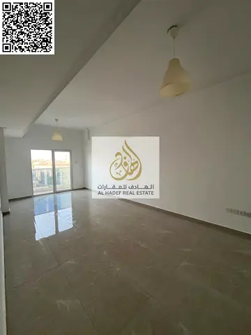 One bedroom and living room, one of the largest spaces, 2 bathrooms with balcony, separate living room in Al Muwaihat, Ajman