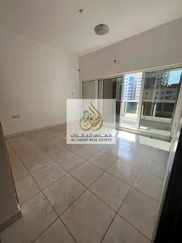 Two Bedroom Hall Apartment for Rent in Sharjah Al Majaz 1 King Faisal Street Family Building CCTV Free Maintenance 24 Hour Security Free AC 15 Days Fr