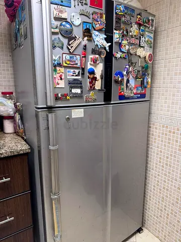 Used Silver Double-Door Refrigerator - Good Working Condition