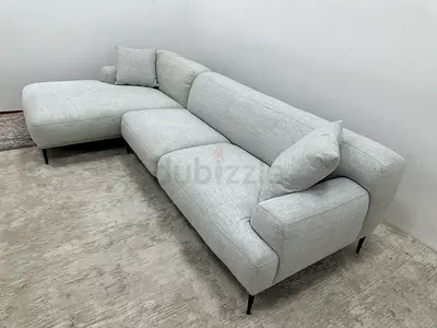 Like new condition the loom collection lshape sofa