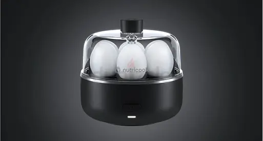 Compact Electric Egg Cooker - 7 Egg Capacity, Like New