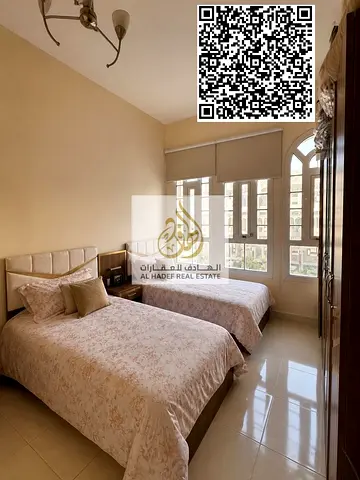 Townhouse for annual rent in Al Zahia area, Uptown Compound. Ground floor: living room, guest bathroom, and kitchen. First floor: two bedrooms with a