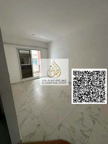 Two-bedroom apartment for rent in Al Jurf 2, Ajman. Separate living room, balcony, 3 bathrooms, 2 master bedrooms with built-in wardrobes. Near Delta