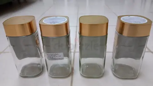Set of 4 Glass Storage Jars with Gold Lids - Good Condition