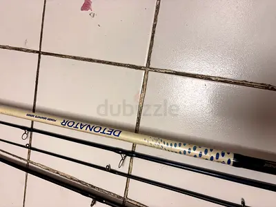 Set of 2 fishing rods (spare guides present) - good working condition