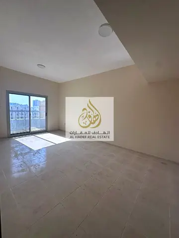 Annual rent in Ajman, Al Nuaimiya area, 1 Al Ittihad Street, Emirates Markets. Family building. Two-bedroom apartment with a living room and balcony.