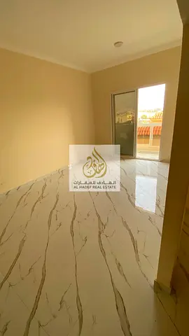 Two bedrooms and a living room with three bathrooms, a separate lounge, second occupancy, open view, large area, and a prime location near the Dubai a