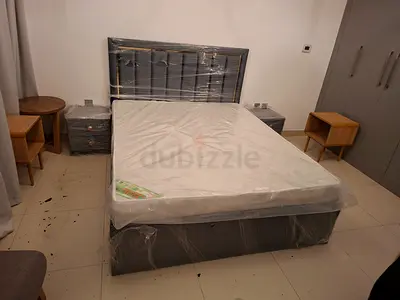 Queen bed with mattress and two bedside tables - barely used
