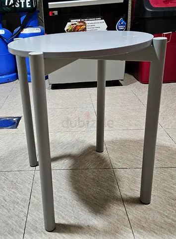 Small round side table with metal legs - light grey